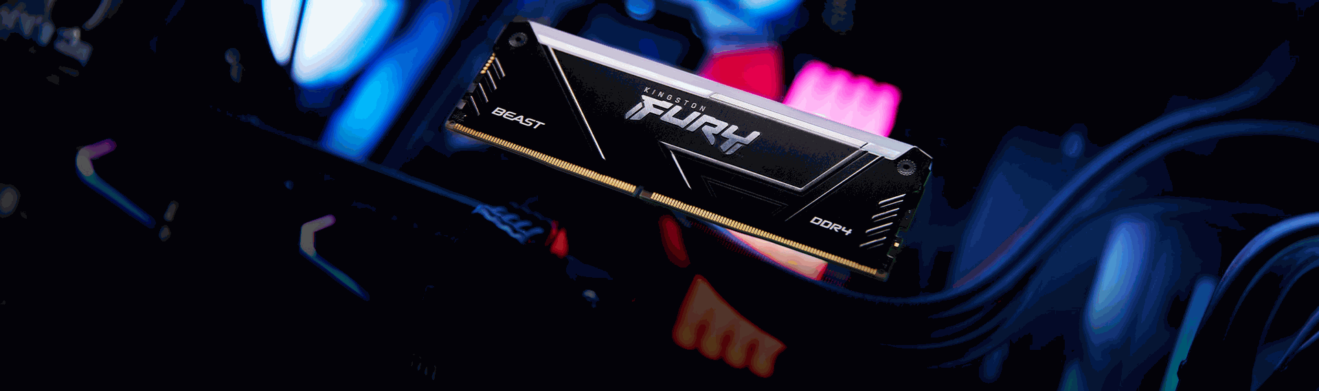 Barrette de RAM Kingston FURY Beast DDR4 installée dans un PC gamer avec éclairage RGB Cette image met en valeur une barrette mémoire Kingston FURY Beast DDR4, idéale pour les configurations gaming. Placée dans un environnement de PC haute performance avec des lumières RGB, elle illustre parfaitement un setup optimisé pour l’activation du profil XMP, garantissant des fréquences élevées et une latence réduite.